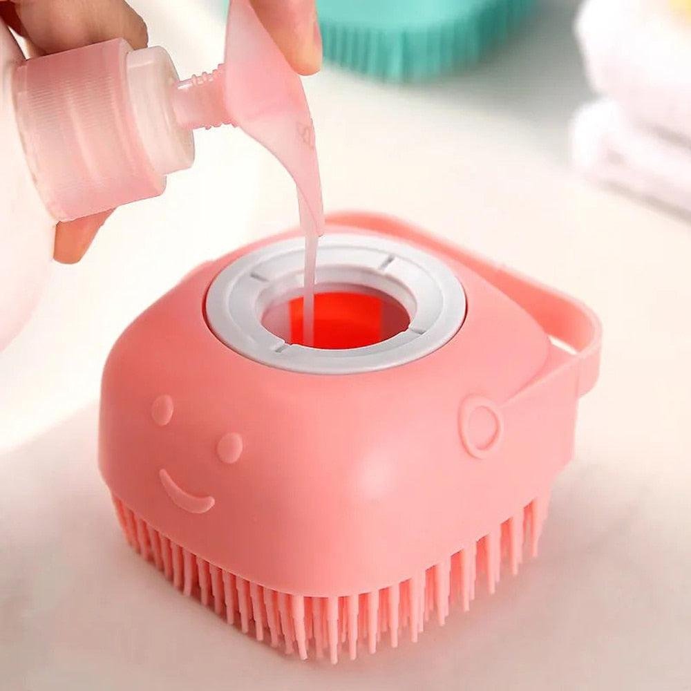 Soft silicone bath brush with dog shampoo compartment